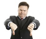 Businessman-frowning-with-thumbs-down.jpg