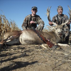 My dad and I with his 2012 muzzleload mule deer