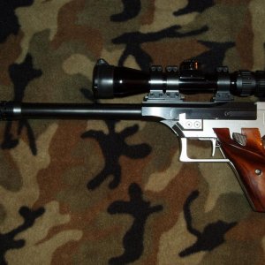 RPM XL Hunter .356/.358 Winchester; Bausch & Lomb Elite 2 x 6 scope in Talley custom 3 ring mount; RPM muzzle brake.