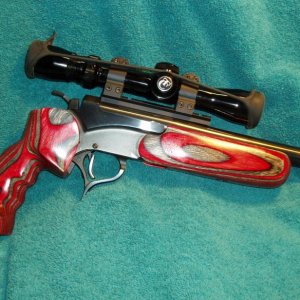 Thompson Center Encore SSK tuned frame.  T/C factory barrel in .308 Winchester.  Georgia Jim custom laminated grip and forend.