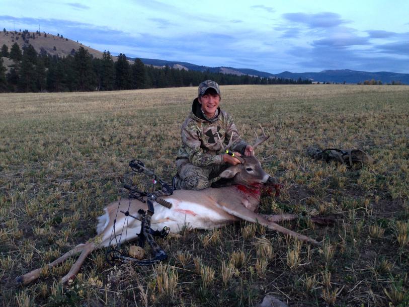 Jake's whitetail buck with a bow