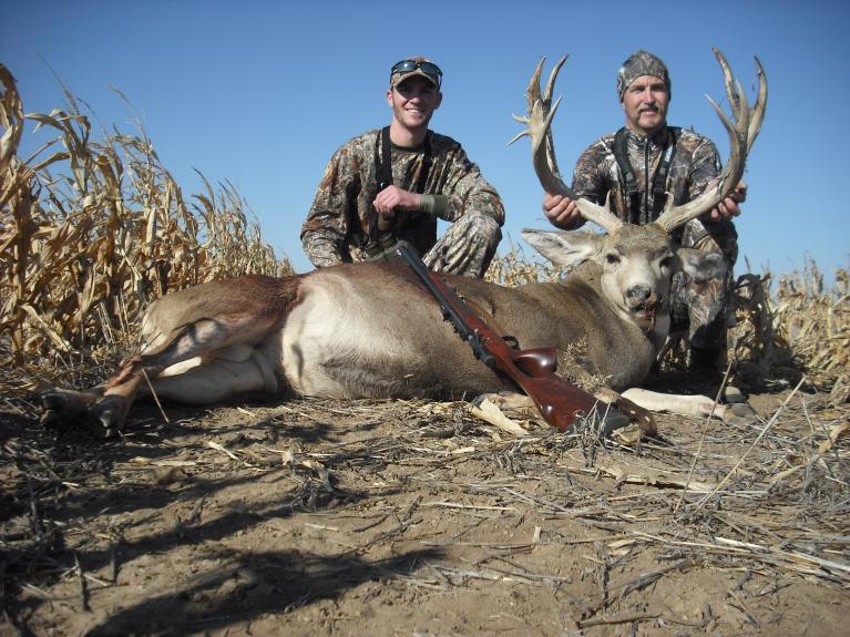 My dad and I with his 2012 muzzleload mule deer