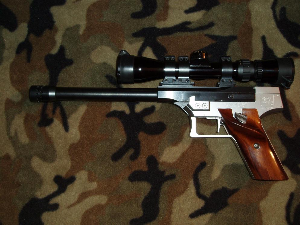 RPM XL Hunter .356/.358 Winchester; Bausch &amp; Lomb Elite 2 x 6 scope in Talley custom 3 ring mount; RPM muzzle brake.