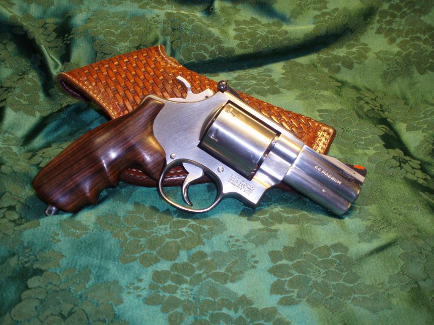 S &amp; W Model 629-3 Lew Horton Custom limited edition in .44 Magnum.  Hogue custom Rosewood Grips.  Magnaported barrel.
Dick Murray custom flap hols