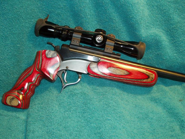 Thompson Center Encore SSK tuned frame.  T/C factory barrel in .308 Winchester.  Georgia Jim custom laminated grip and forend.